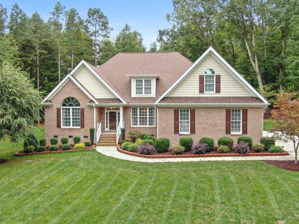 Beautiful house with manicured lawn